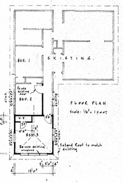 Kitchen and hallway leading to the three bedrooms