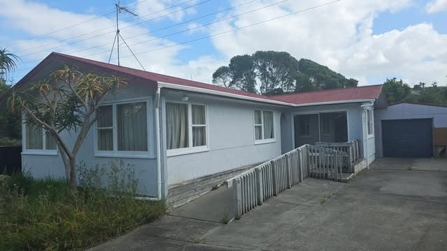 Exterior of the three bedroom home clad in cement weatherboard
