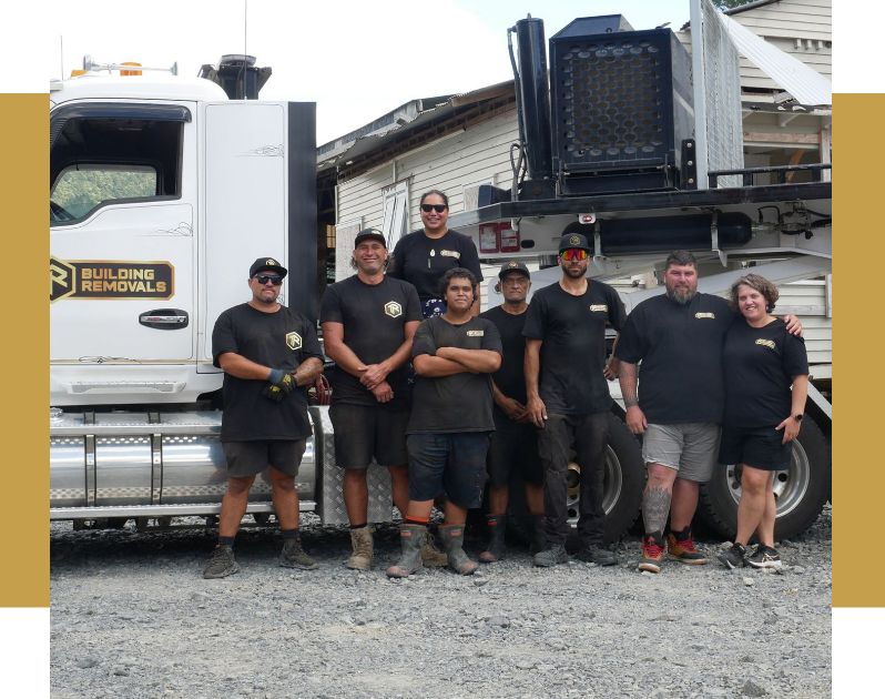 The TR Building Removals crew working beneath a raised house