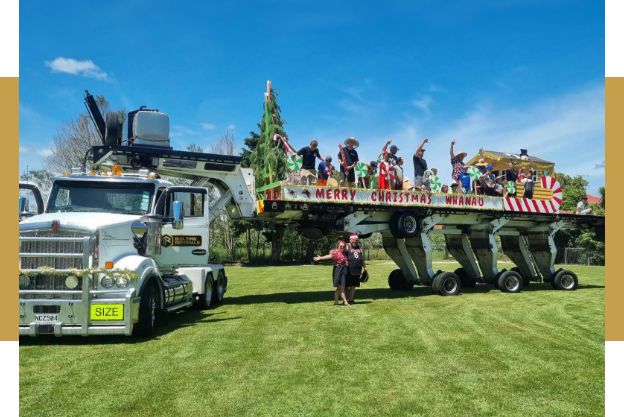 A house under relocation being positioned on a rural site in Northland